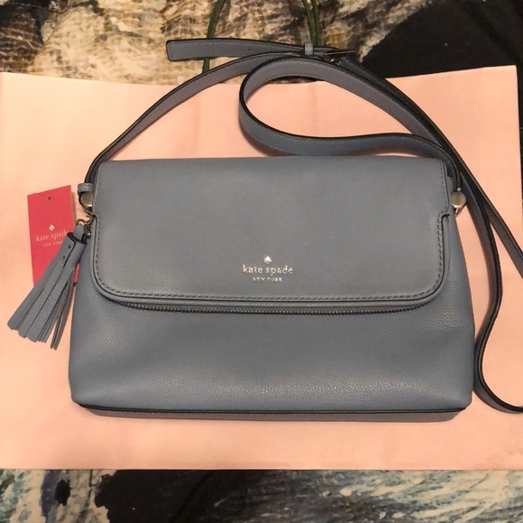 A small to medium sized, light blue, Kate Spade cross body
